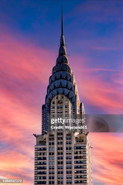 chrysler building against orange sky during sunset, new york, usa - chrysler building stock pictures, royalty-free photos & images