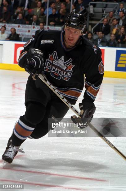 Calle Johansson of the Washington Capitals skates against the Toronto Maple Leafs during NHL game action on November 29, 1999 at Air Canada Centre in...