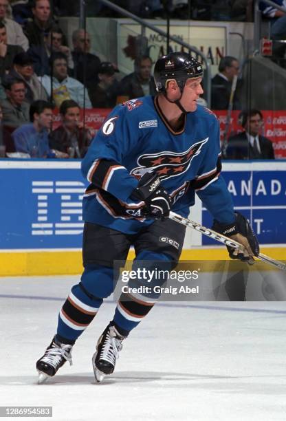 Calle Johansson of the Washington Capitals skates against the Toronto Maple Leafs during NHL game action on January 22, 2000 at Air Canada Centre in...