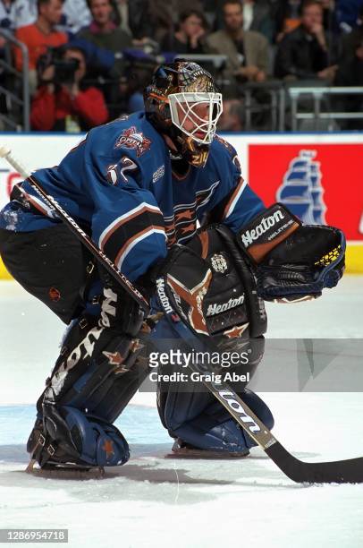 Olaf Kolzig of the Washington Capitals skates against the Toronto Maple Leafs during NHL game action on January 22, 2000 at Air Canada Centre in...