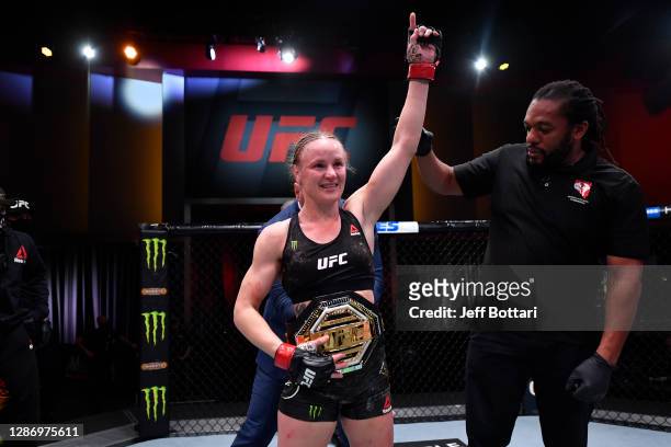 Valentina Shevchenko of Kyrgyzstan celebrates her victory over Jennifer Maia of Brazil in their women's flyweight championship bout during the UFC...
