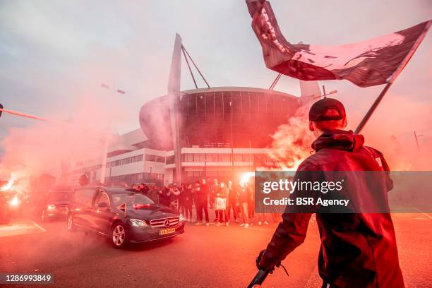 Eindhoven supporters pay tribute to late PSV chairman Harry van Raaij at the Philips Stadion stadium on November 21, 2020 in Eindhoven, Netherlands....