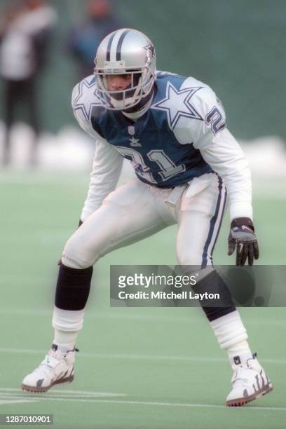 Deion Sanders of the Dallas Cowboys in position during a football game against the Philadelphia Eagles on December 10, 1995 at Veterans Stadium in...