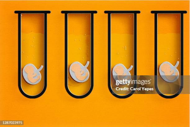 conceptual image of human cloning. - embryos stock pictures, royalty-free photos & images