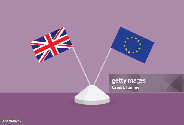 uk and euro flag on a table - eu referendum stock illustrations