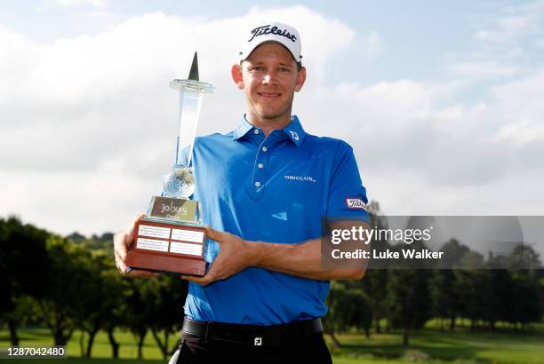 Joachim B. Hansen of Denmark plays his second shot on the 18th hole during the final round of the Joburg Open at Randpark Golf Club on November 22,...