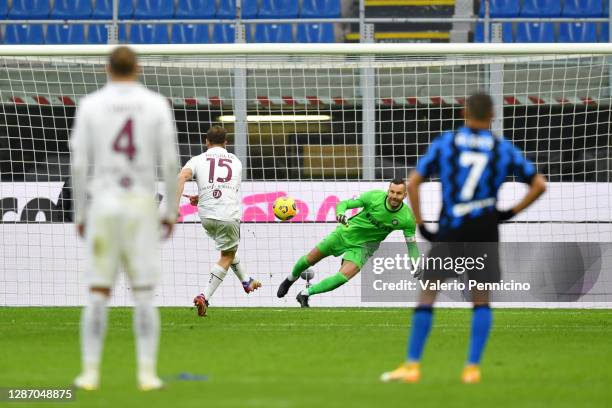Cristian Ansaldi of Torino scores their sides second goal from the penalty spot past Samir Handanovic of Inter Milan during the Serie A match between...