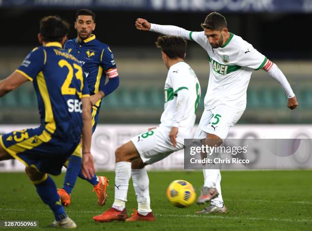 Domenico Berardi of US Sassuolo scores their sides second goal during the Serie A match between Hellas Verona FC and US Sassuolo at Stadio...