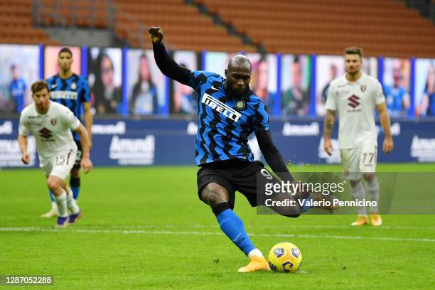 Romelu Lukaku of Inter Milan scores their sides third goal from the penalty spot during the Serie A match between FC Internazionale and Torino FC at...
