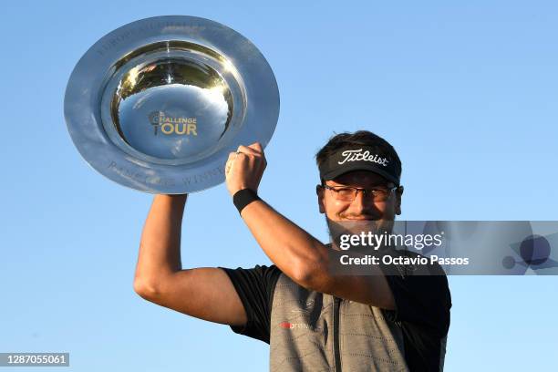 Ondrej Lieser of The Czech Republic celebrates with the trophy following victory during day four of the Challenge Tour Grand Final at T-Golf and...