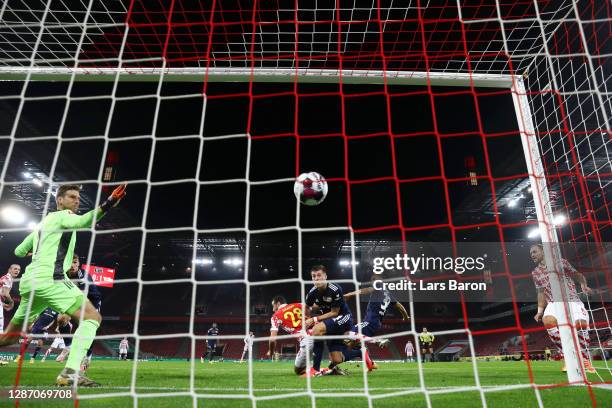 Ellyes Skhiri of 1. FC Koeln scores their sides first goal during the Bundesliga match between 1. FC Koeln and 1. FC Union Berlin at...