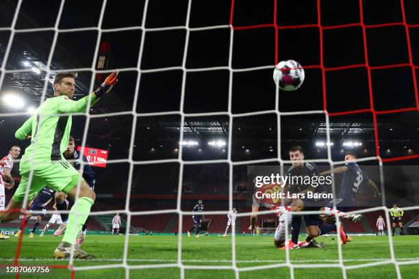 Ellyes Skhiri of 1. FC Koeln scores their sides first goal during the Bundesliga match between 1. FC Koeln and 1. FC Union Berlin at...