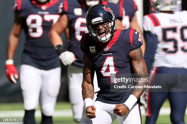 Deshaun Watson of the Houston Texans reacts following a touchdown in the first quarter during their game against the New England Patriots at NRG...