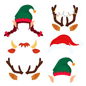 Christmas antlers with light garland, elf hat and ears, bull horns. Funny masks