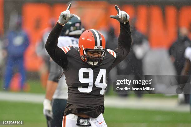 Adrian Clayborn of the Cleveland Browns celebrates after a sack during the first half against the Philadelphia Eagles at FirstEnergy Stadium on...