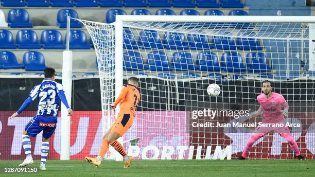 Ximo Navarro of Deportivo Alaves scores their team's first goal during the La Liga Santander match between Alaves and Valencia on November 22, 2020...