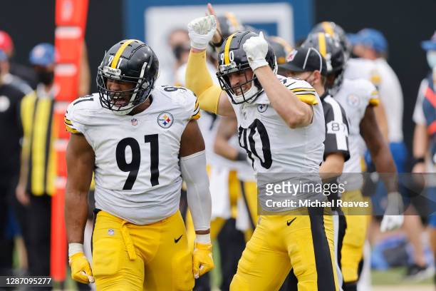 Stephon Tuitt and T.J. Watt of the Pittsburgh Steelers celebrate a sack during the second half against the Jacksonville Jaguars at TIAA Bank Field on...