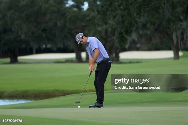 Robert Streb of the United States attempts a putt for birdie on the 18th green during the final round of The RSM Classic at the Seaside Course at Sea...