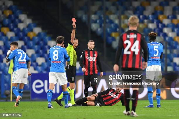 Tiemoue Bakayoko of S.S.C. Napoli is shown a red card by referee Paolo Valeri during the Serie A match between SSC Napoli and AC Milan at Stadio San...