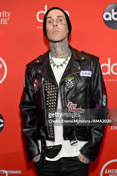 In this image released on November 22, Travis Barker attends the 2020 American Music Awards at Microsoft Theater on November 22, 2020 in Los Angeles,...