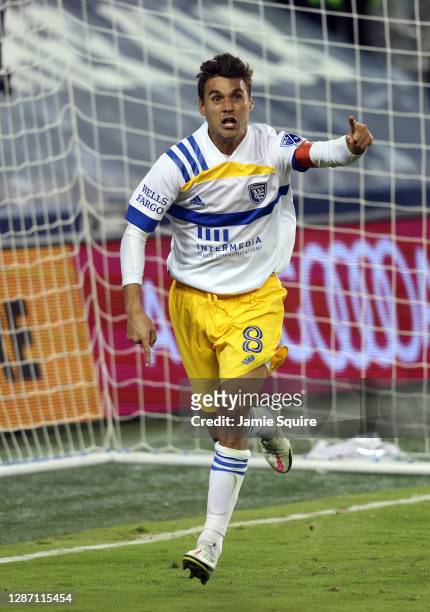 Chris Wondolowski of San Jose Earthquakes celebrates after scoring in the final seconds of regulation time during the MLS Cup playoff game against...
