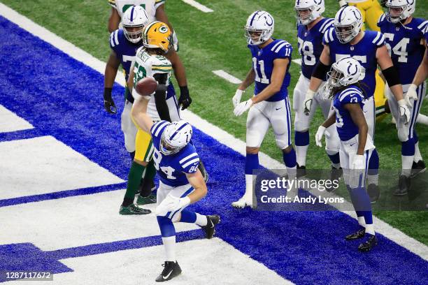Jack Doyle of the Indianapolis Colts celebrates after scoring a touchdown against the Green Bay Packers during the third quarter in the game at Lucas...