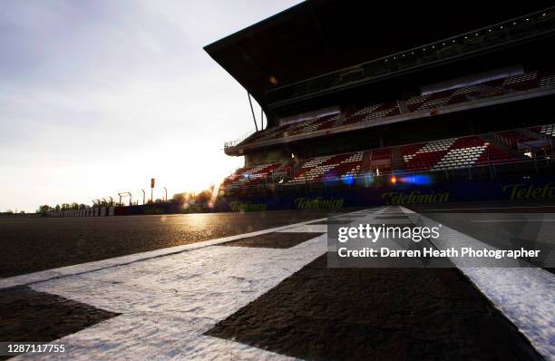 The start and finish line and main grandstand in sunrise light at the 2009 Spanish Grand Prix, Circuit de Barcelona-Catalunya, on the 09 May 2009.