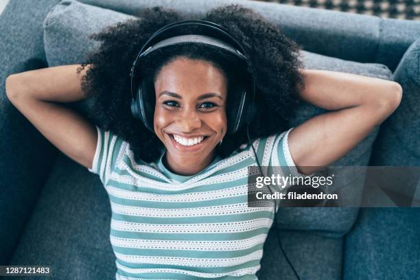 enjoying music at home - listening to radio stock pictures, royalty-free photos & images
