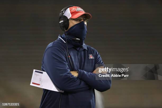 Defensive Coordinator Paul Rhoads of the Arizona Wildcats watches play in the third quarter against the Washington Huskies at Husky Stadium on...