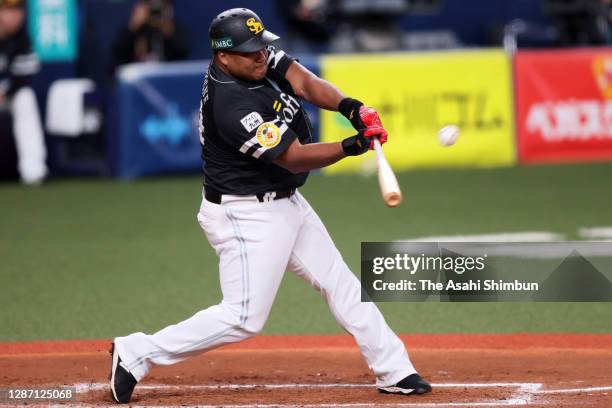 Alfredo Despaigne of the Fukuoka SoftBank Hawks hits a grand slam to make it 11-2 in the 7th inning during the game two of the Japan Series against...