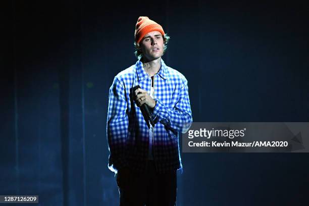 In this image released on November 22, Justin Bieber performs onstage for the 2020 American Music Awards at Microsoft Theater on November 22, 2020 in...