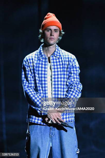 In this image released on November 22, Justin Bieber performs onstage for the 2020 American Music Awards at Microsoft Theater on November 22, 2020 in...