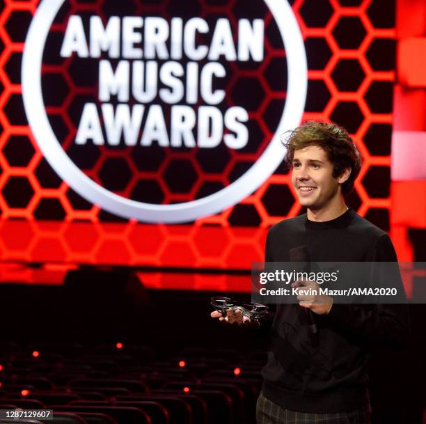 In this image released on November 22, David Dobrik speaks during the 2020 American Music Awards at Microsoft Theater on November 22, 2020 in Los...