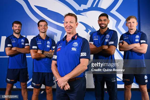 New Kangaroos coach David Noble poses with Luke McDonald, Jy Simpkin, Tarryn Thomas and Jack Ziebell of the Kangaroos during a North Melbourne...