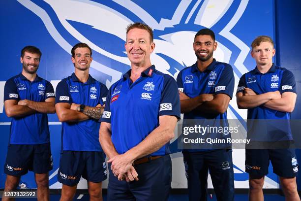 New Kangaroos coach David Noble poses with Luke McDonald, Jy Simpkin, Tarryn Thomas and Jack Ziebell of the Kangaroos during a North Melbourne...