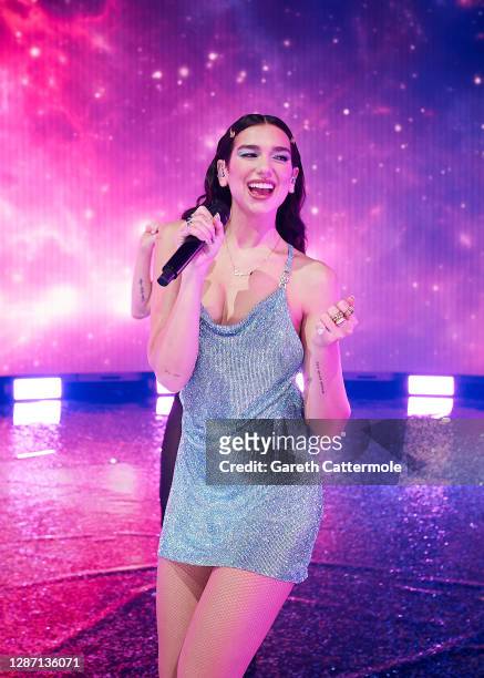 In this image released on November 22, Dua Lipa performs onstage for the 2020 American Music Awards, broadcast on November 22, 2020 London, England.