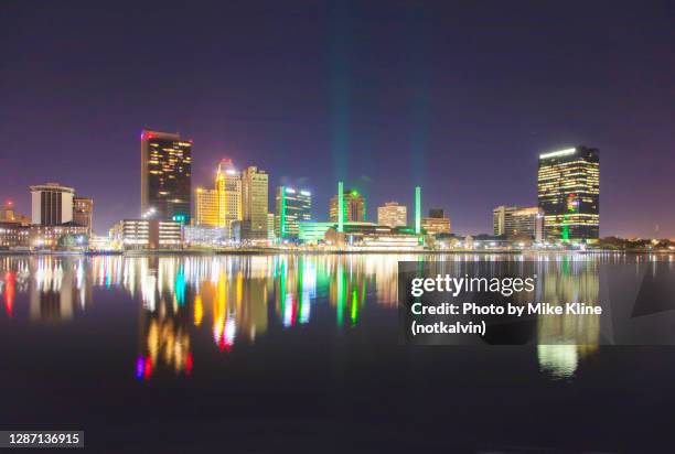 toledo ohio mirrored on the maumee river - maumee-river stock pictures, royalty-free photos & images