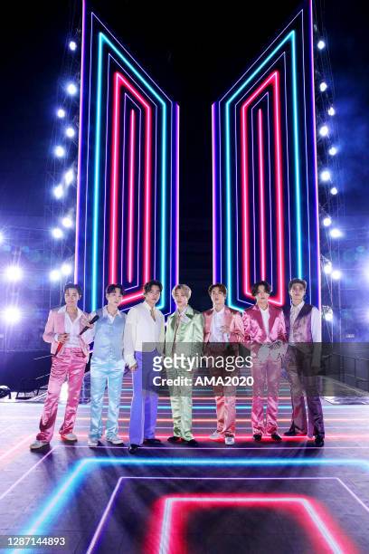 In this image released on November 22, J-Hope, Suga, V, Jimin, Jin, Jungkook, RM of BTS perform onstage for the 2020 American Music Awards on...