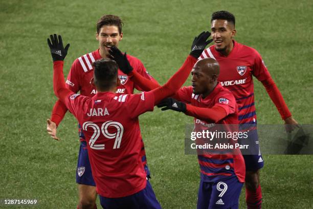 Franco Jara of FC Dallas celebrates his goal with his teammates in the first half against the Portland Timbers during Round One of the MLS Cup...