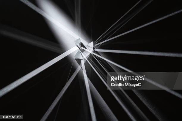 prism refracting light beam - prism in motion stock pictures, royalty-free photos & images