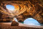 beatuful woman in Benagil Cave, Algarve, Portugal