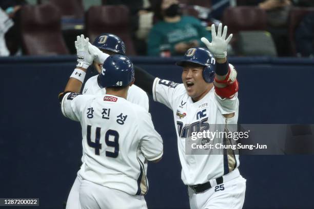 Catcher Yang Eui-Ji of NC Dinos reacts after hitting two home runs in the bottom of sixth inning during the Korean Series Game Five between Doosan...