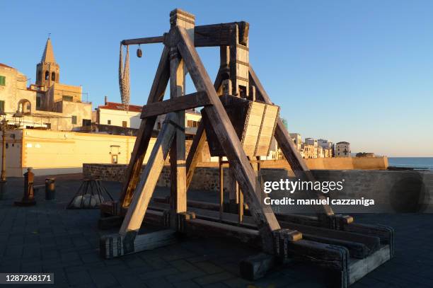 seafront bastions in alghero, sardinia, italy - zwiesel stock-fotos und bilder