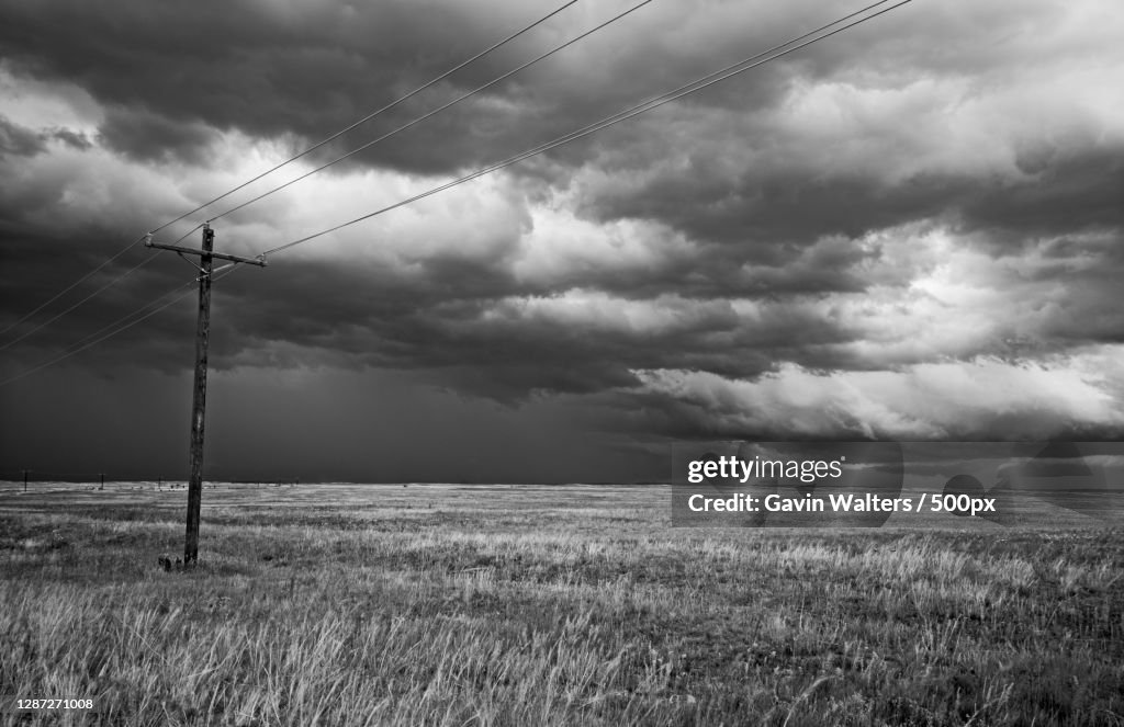 Scenic view of field against cloudy sky,Colorado,United States,USA