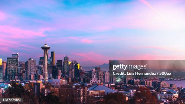 aerial view of buildings in city against sky during sunset,seattle,washington,united states,usa - seattle fotografías e imágenes de stock