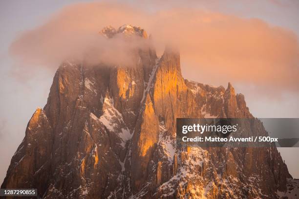 low angle view of rock formation against sky,seggiovia sole chairlift,italy - seggiovia stock pictures, royalty-free photos & images