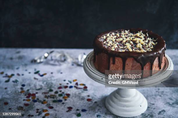 chocolate layer cake - cakestand stock pictures, royalty-free photos & images