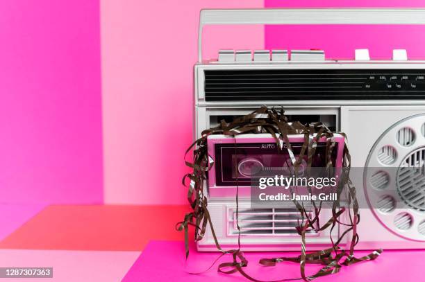 damaged audio tape in tape player - cassette stock pictures, royalty-free photos & images