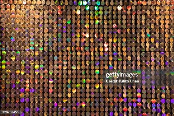 colorful sequins reflection - sequin stock-fotos und bilder