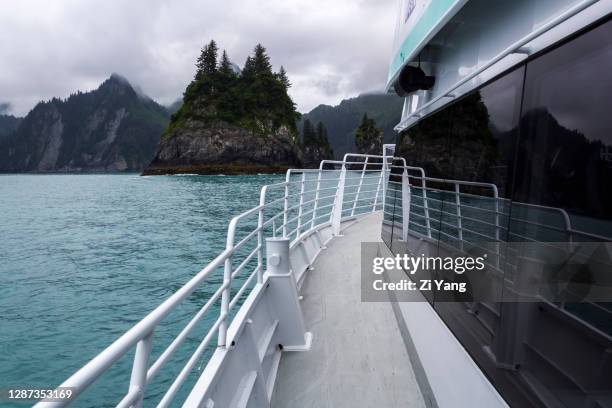 sea stacks and cruise boat at kenai fjords national park - alaska cruise stock pictures, royalty-free photos & images